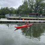 kayaker on Canadarago Lake