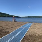 beach at Glimmerglass with a wheelchair path