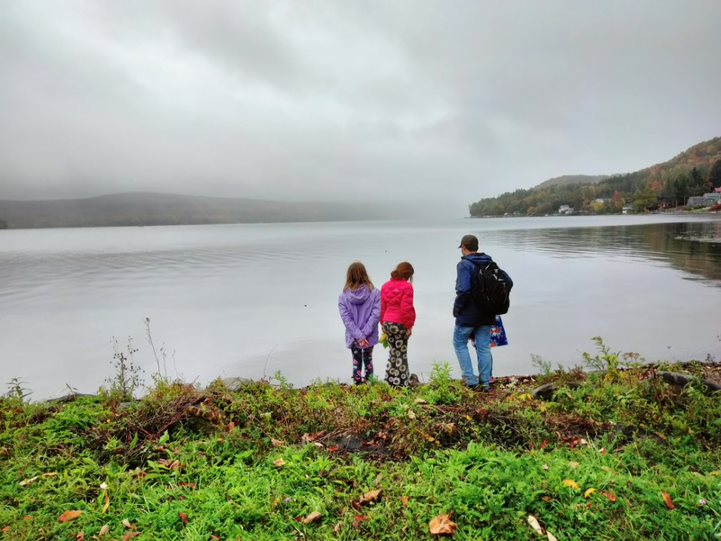 Three children looking at lake at Mohican Farm