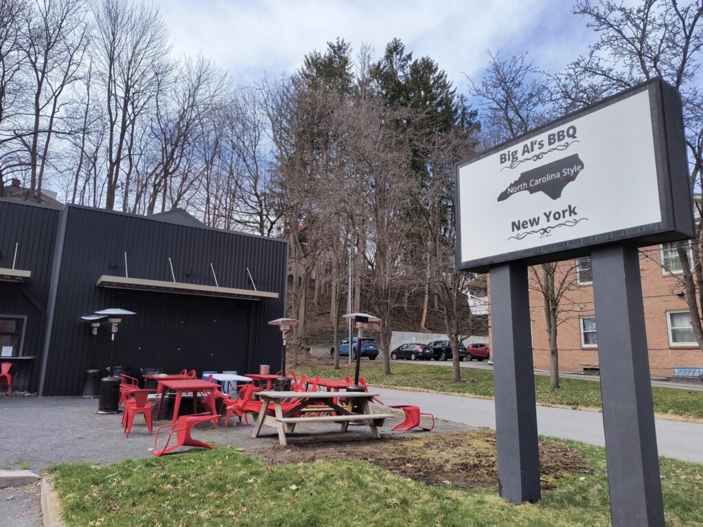 Big Al's BBQ sign and picnic area