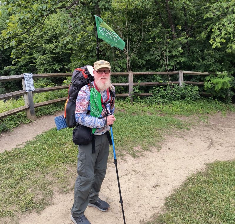 Tom Walsh with backpack and hiking pole on the Long Path