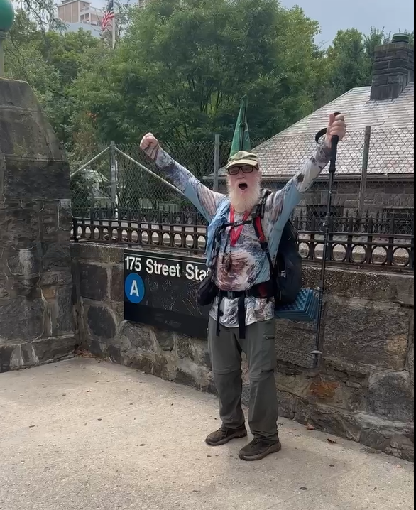 Tom Walsh celebrates completing the Long Path in New York City