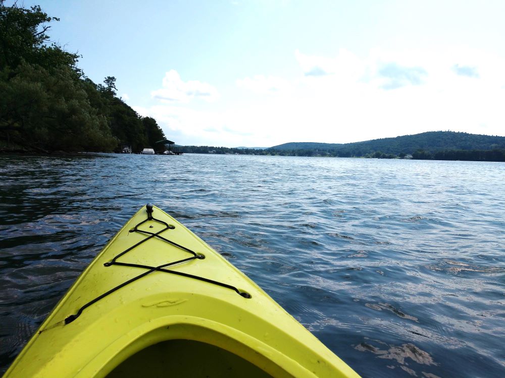 yellow kayak on lake